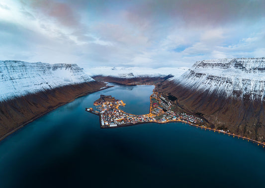 Isafjordur with snow-capped mountains.